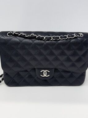 Chanel Quilted Black Double Flap Jumbo Caviar Bag